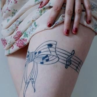 Sexy Music Notes tattoo design on thighs
