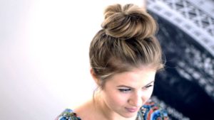 Messy top knot hairstyle
